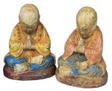 Praying Monk in cement, Size H10, L8, W7 cm. Price FOB 1,55 usd excl packing. Art. code: CP117(to the left) and CP118(to the right).